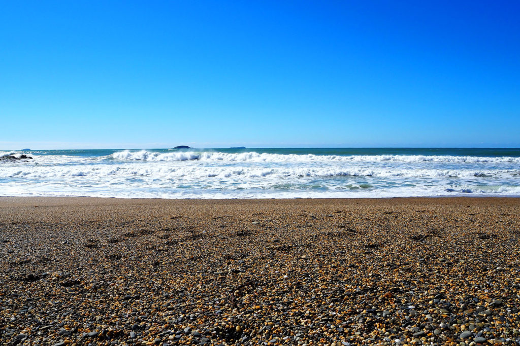 The pebbly beach at Charlesworth Bay